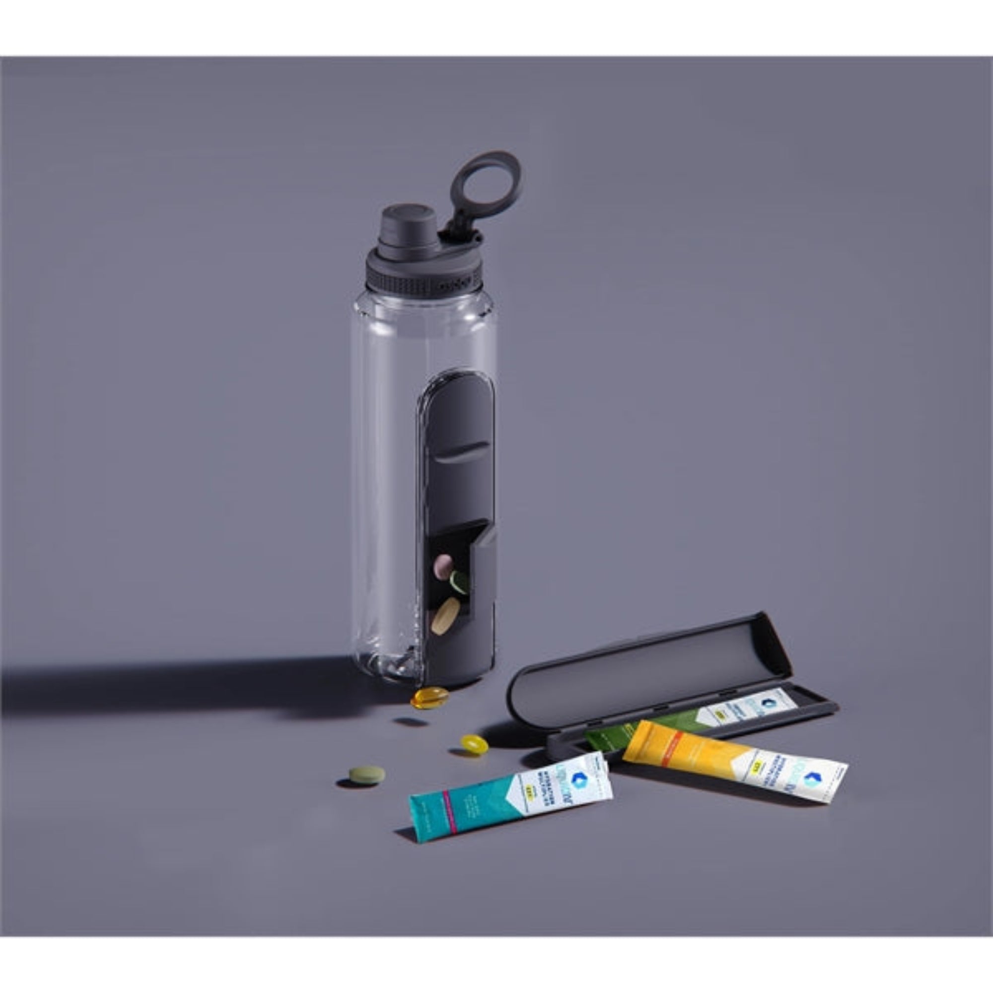 Butelka ASOBU Electrolyte czarna 1,3 l – wytrzymały tritan, wbudowany pojemnik na suplementy, szczelna i lekka, idealna dla aktywnych