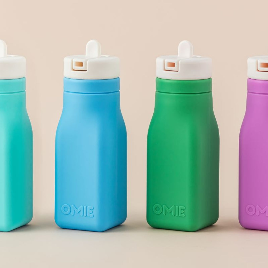 Turkusowa butelka OmieBottle – pastelowa, poręczna i bez BPA, dla dzieci do szkoły i przedszkola.