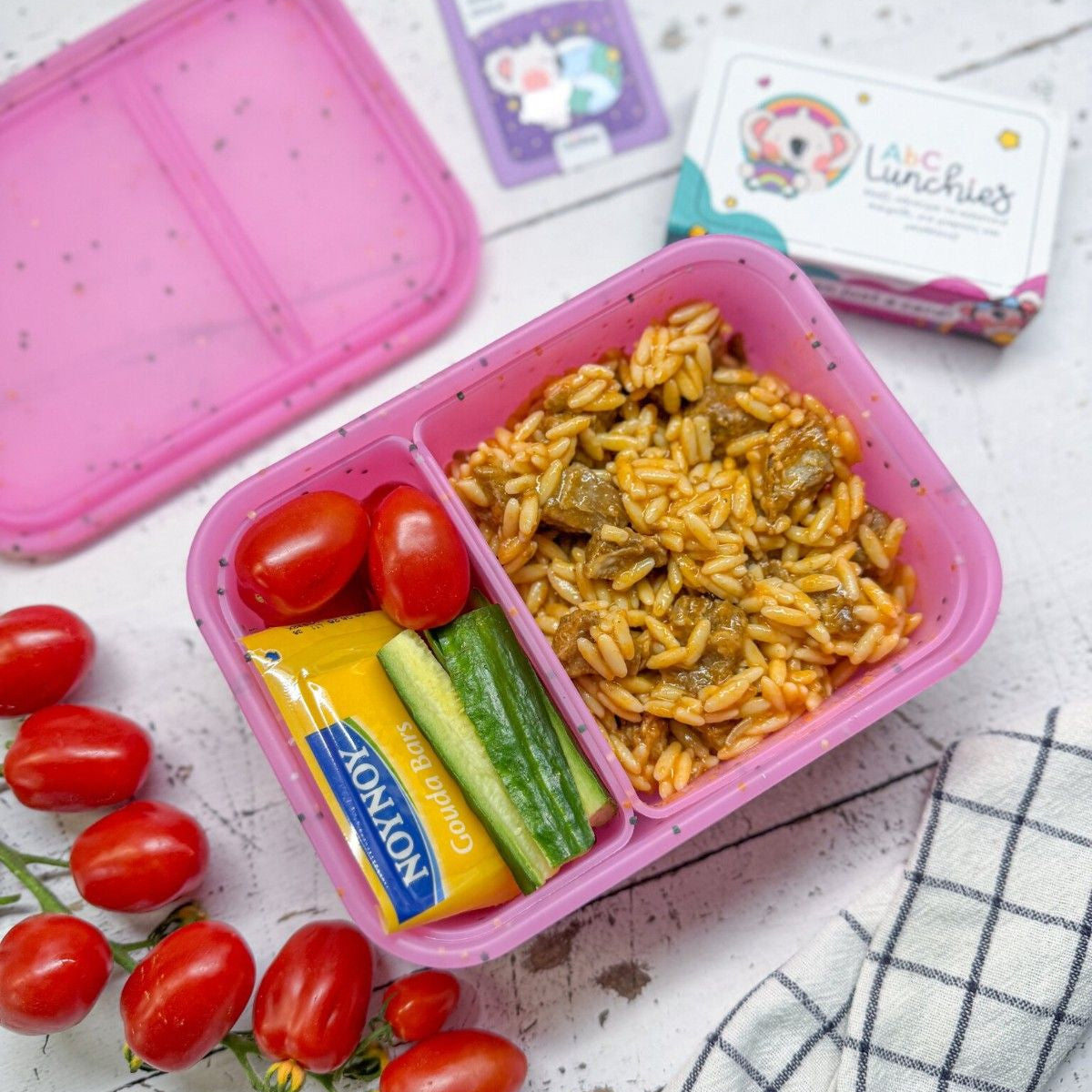 Różowy silikonowy lunchbox z dwiema przegródkami do przedszkola ABC Lunchies