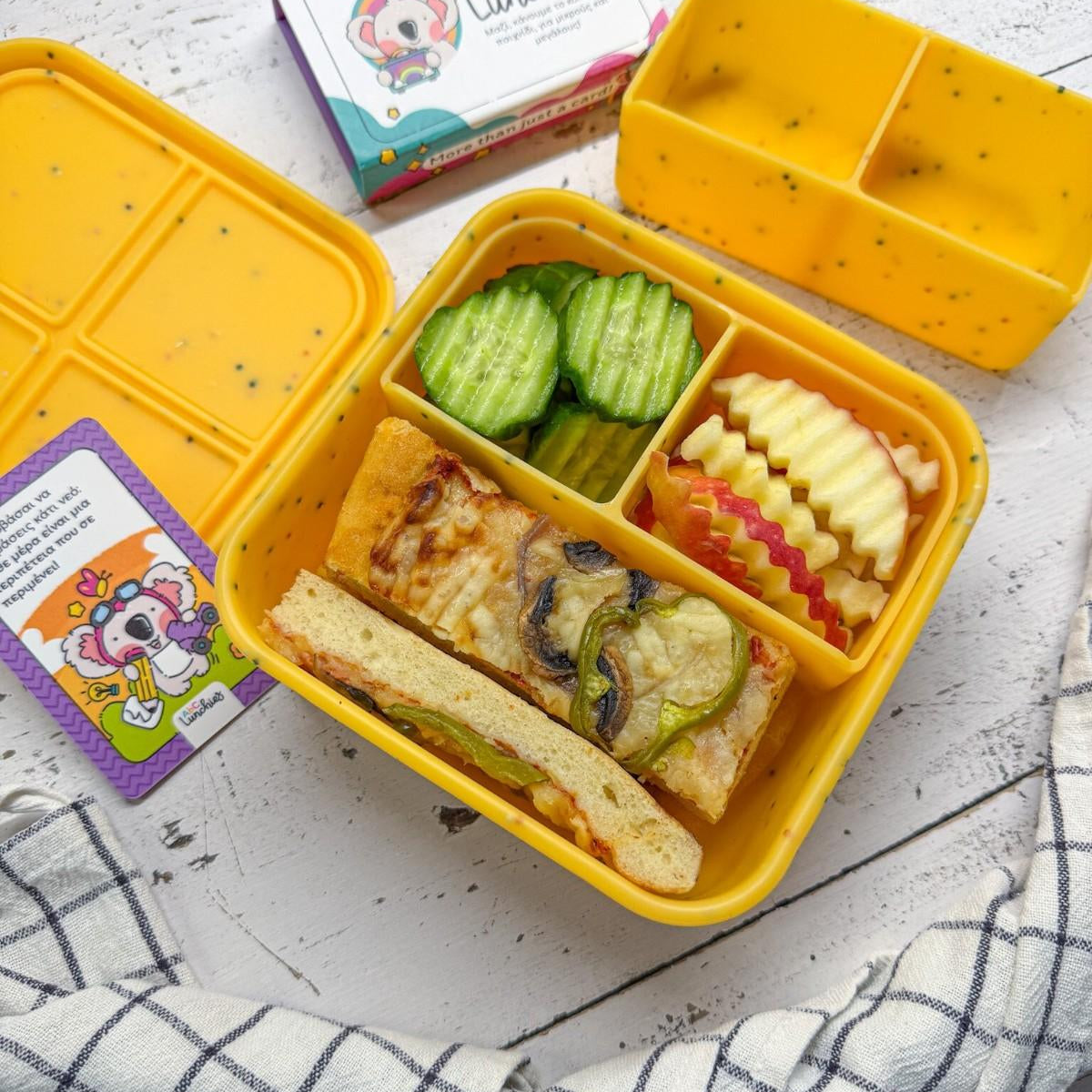 Pomarańczowe silikonowe pudełko na lunch z 4 komorami ABC Lunchies