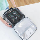 Torba termiczna MontiiCo Dinosaur M – dwie komory, wkład chłodzący, wodoodporna i trwała, wzór: dinozaury