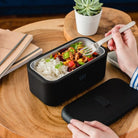 Monbento Warmer – elektryczny lunchbox 700 ml z 3 trybami podgrzewania. Ciepły posiłek w 15–30 min, szczelny, kompaktowy, made in France.