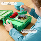 OmieBox Apple Green – pastelowo zielony lunchbox z termosem, przegródkami i uchwytem, idealny do szkoły i przedszkola.