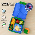 OmieBox Monster Blue – niebieski lunchbox z termosem, przegródkami i uchwytem, idealny do szkoły i przedszkola.