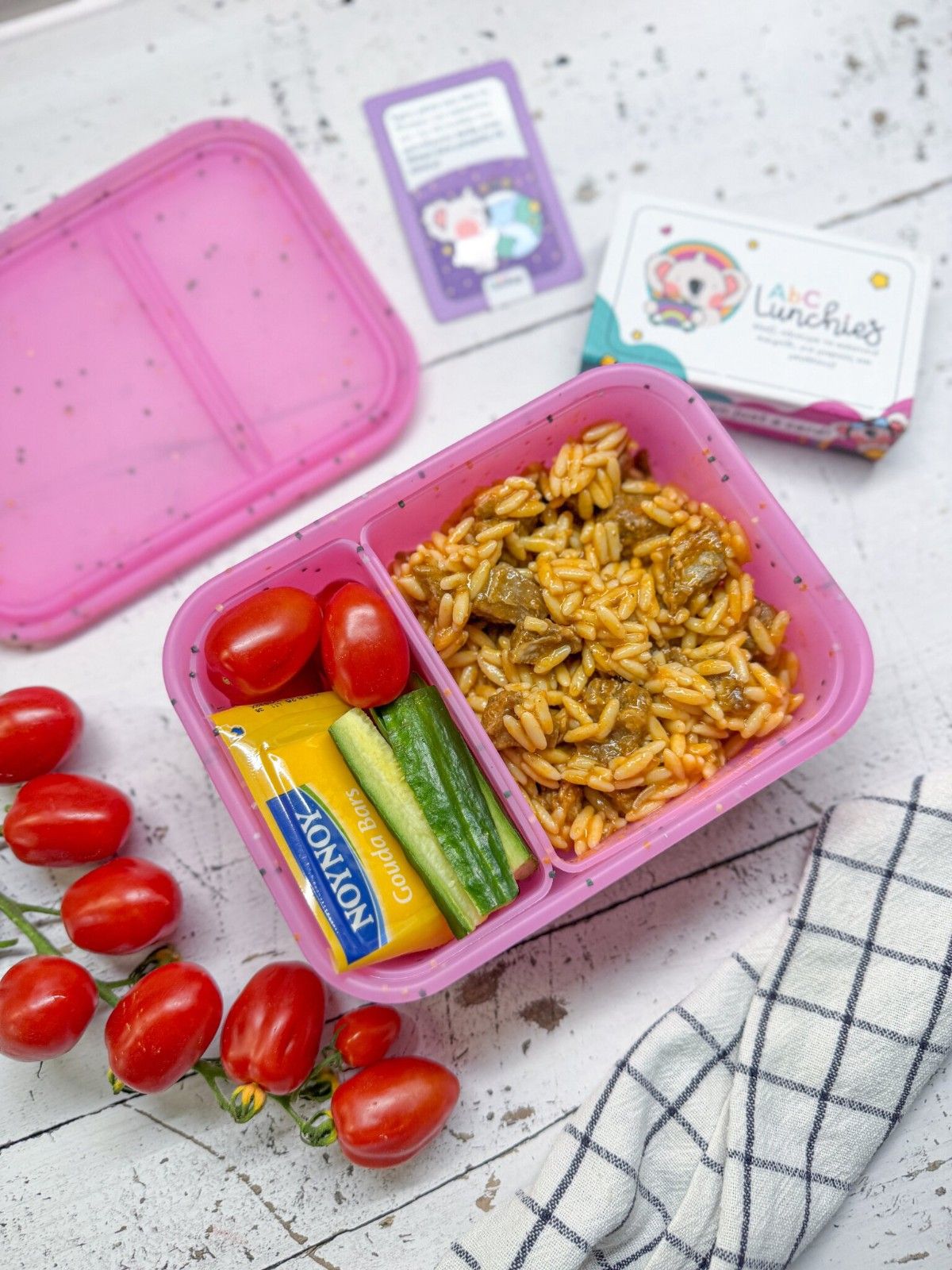 Różowy silikonowy lunchbox z dwiema przegródkami do przedszkola ABC Lunchies