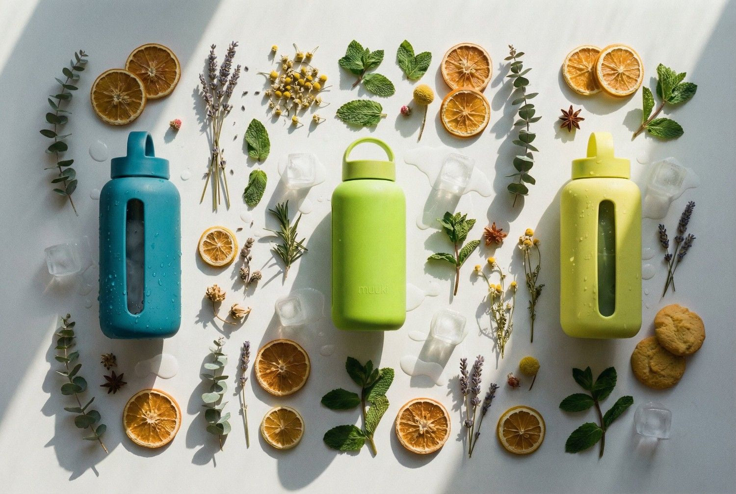 Szklany bidon Muuki Sunny Lemonade z żółtą silikonową osłoną