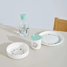 Turkusowa butelka na smoothie i wodę RIG-TIG DRIK-IT Turqouise - lekka i szczelna butelka z tritanu, szeroki wlew, ekologiczna, ze wzorem Muminków.