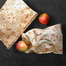 Woreczek na żywność BeePack Bees – wielorazowe opakowanie z bawełny,  antybakteryjny, bez plastiku, wzór: pszczoły