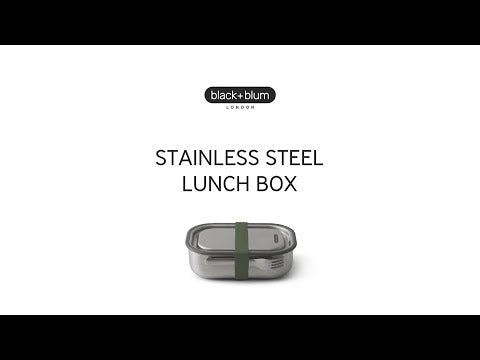 Lunchbox Black+Blum Steel L pomarańczowy – szczelny pojemnik z separatorem, widelcem i silikonową opaską. Elegancki, praktyczny i trwały