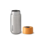 Kubek termiczny Black+Blum Travel Cup 340 ml – pomarańczowy, stal nierdzewna, system blokady, szczelność 100%. Idealny do pracy, auta i na spacer
